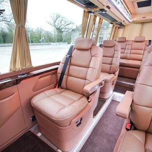 tempo traveller with sofa seats