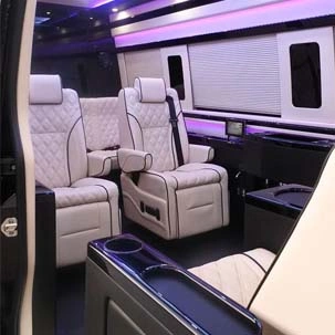 tempo traveller with sofa seats